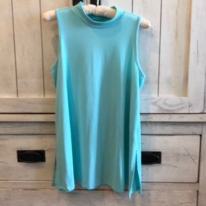 Sleeveless mock turtleneck with side slits